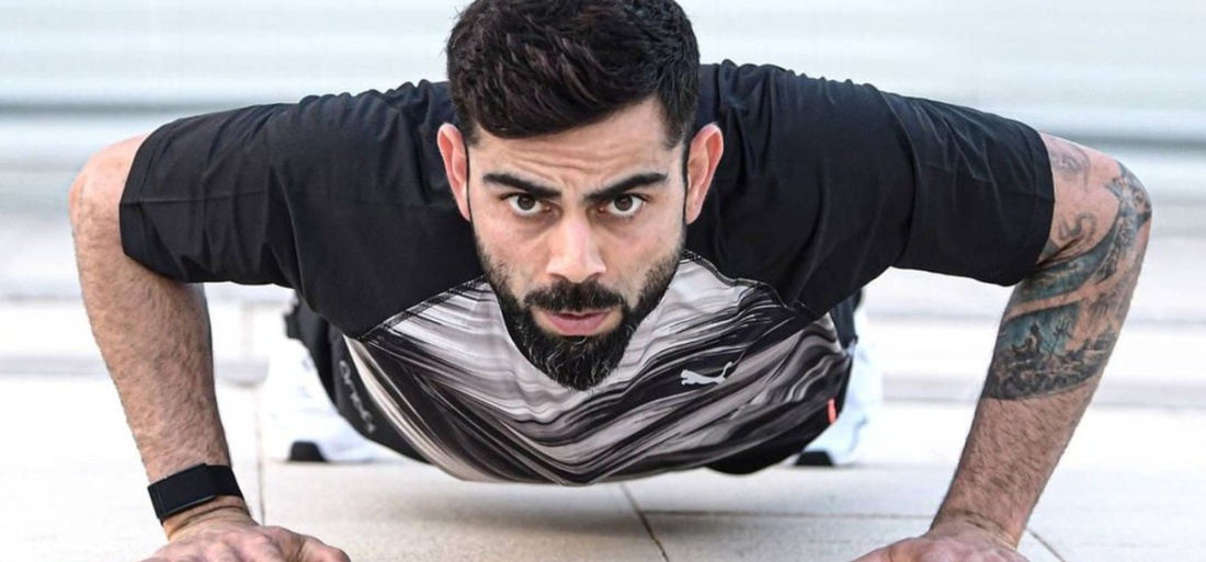 Virat Kohli doing a push up Virat Kohli doing a push up
